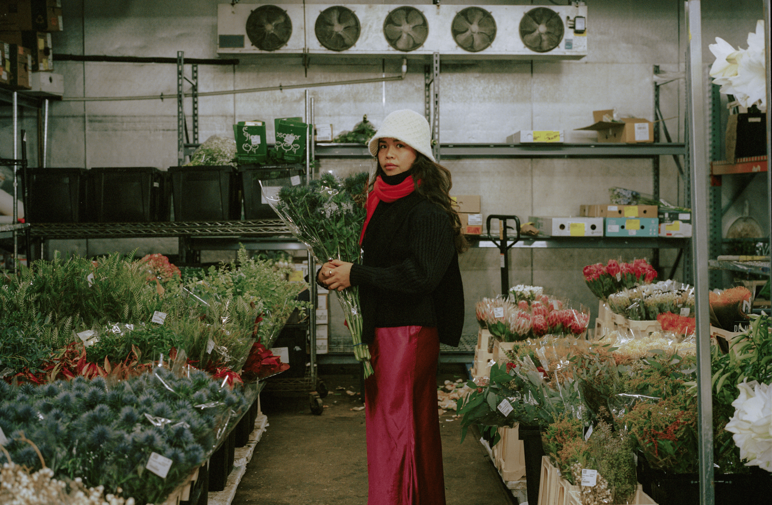 Kelly holding flowers